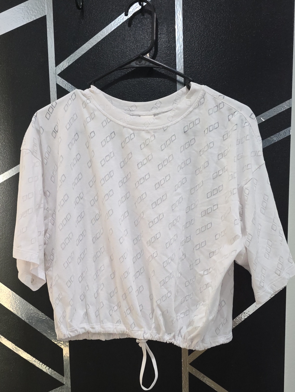 Lorna Jane White Short Sleeve Drawstring Crop Top with Subtle Geometric Print